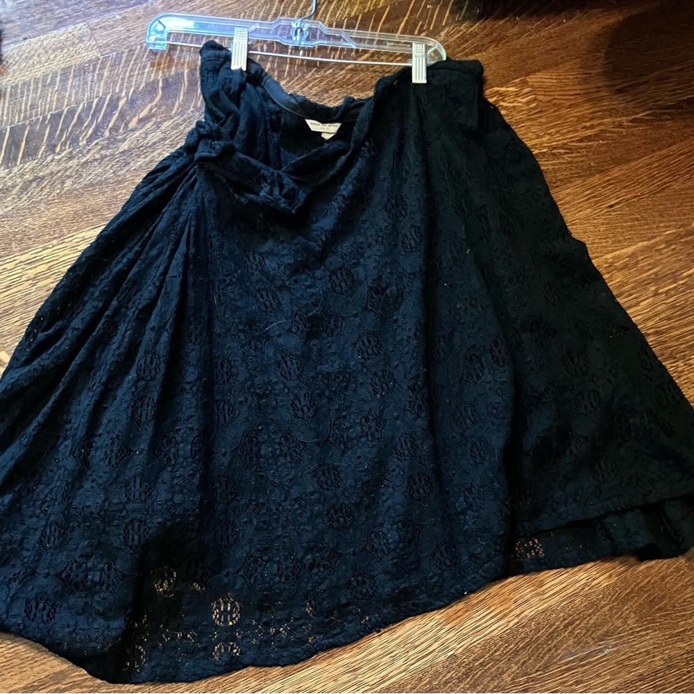 Dries Van Noten Black lazer cut lace skirt. Below knee ,can wear low on hips